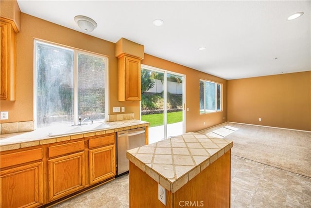 6356 Claridge Dr, Riverside, CA 92506 - kitchen with light carpet, a sink, tile countertops, open floor plan, and stainless steel dishwasher