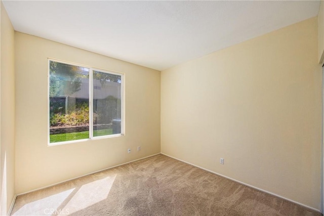 6356 Claridge Dr, Riverside, CA 92506 - carpeted empty room featuring baseboards and plenty of natural light