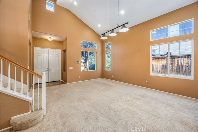 6356 Claridge Dr, Riverside, CA 92506 - interior space with visible vents, stairway, high vaulted ceiling, baseboards, and carpet