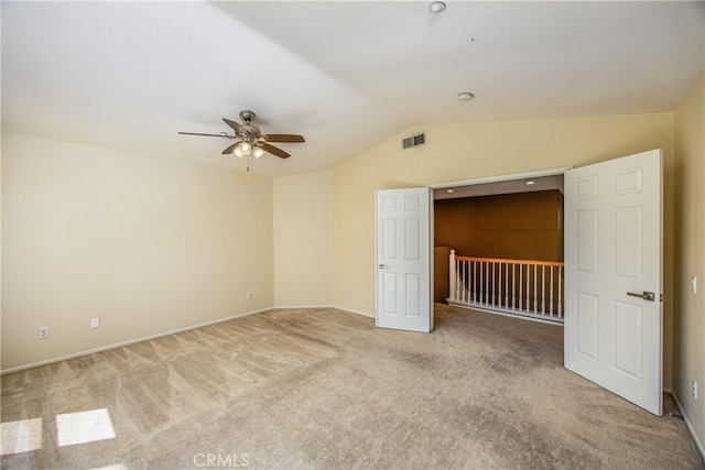 6356 Claridge Dr, Riverside, CA 92506 - unfurnished bedroom featuring baseboards, carpet, lofted ceiling, and visible vents