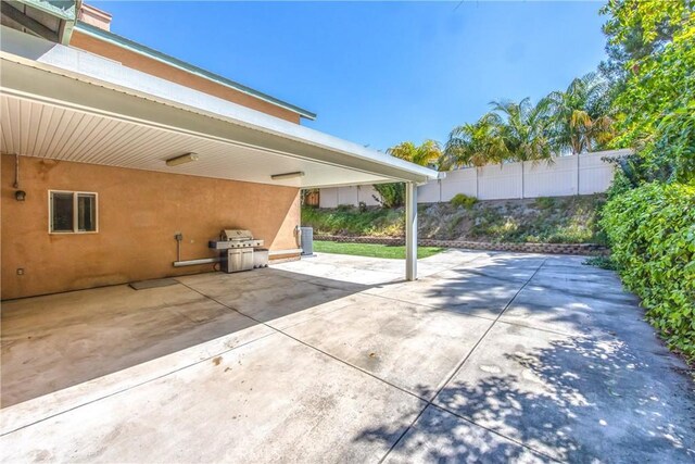 6356 Claridge Dr, Riverside, CA 92506 - view of patio with fence and a grill
