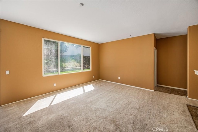 6356 Claridge Dr, Riverside, CA 92506 - spare room featuring carpet floors and baseboards