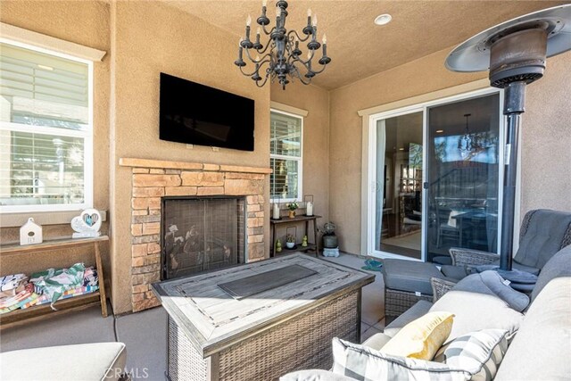 22514 Brightwood Pl, Saugus, CA 91350 - view of patio / terrace with an outdoor living space with a fireplace