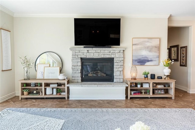 living area featuring tile patterned floors, a stone fireplace, and ornamental molding