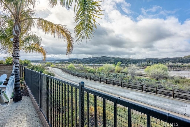 balcony featuring a mountain view