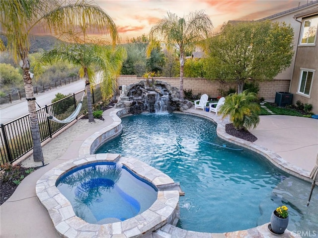 22514 Brightwood Pl, Saugus, CA 91350 - view of pool featuring a pool with connected hot tub, a fenced backyard, and a patio