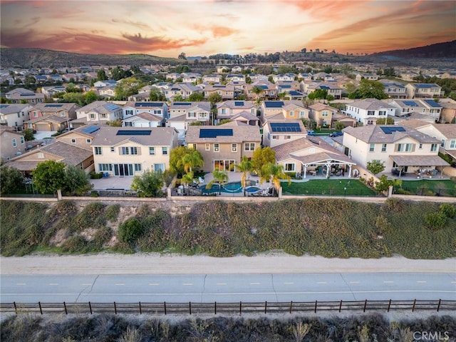 aerial view with a mountain view and a residential view