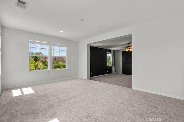 22514 Brightwood Pl, Saugus, CA 91350 - empty room featuring light colored carpet, healthy amount of natural light, recessed lighting, and ceiling fan