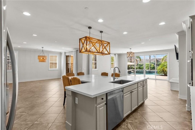 22514 Brightwood Pl, Saugus, CA 91350 - kitchen featuring appliances with stainless steel finishes, a chandelier, open floor plan, light tile patterned flooring, and recessed lighting