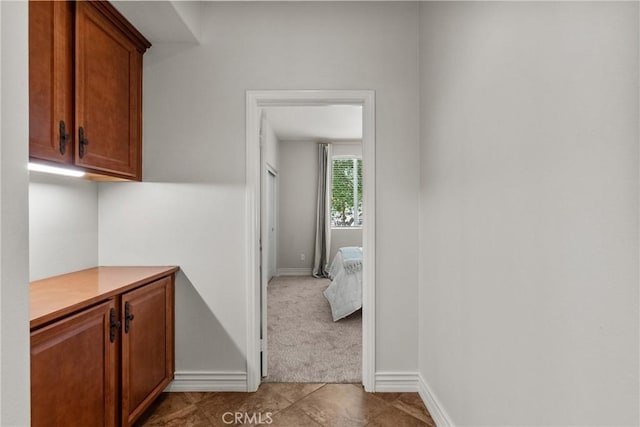 22514 Brightwood Pl, Saugus, CA 91350 - hallway with light carpet and light tile patterned flooring