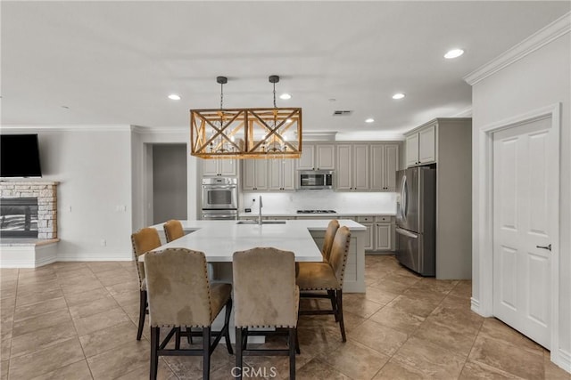 22514 Brightwood Pl, Saugus, CA 91350 - dining room featuring crown molding, light tile patterned flooring, recessed lighting, and a fireplace