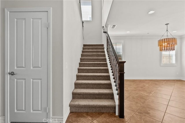 22514 Brightwood Pl, Saugus, CA 91350 - staircase featuring tile patterned floors, a chandelier, ornamental molding, and recessed lighting