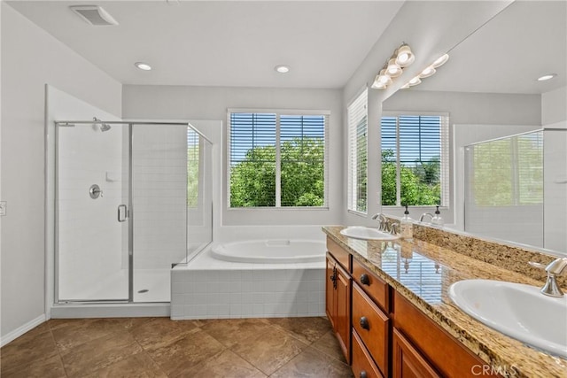 22514 Brightwood Pl, Saugus, CA 91350 - full bathroom with a garden tub, double vanity, a stall shower, tile patterned flooring, and recessed lighting