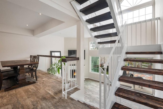 stairs with wood finished floors