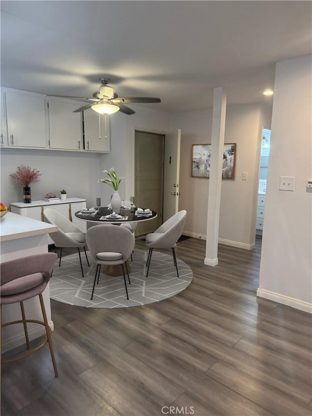 4727 W 147th St Unit 116, Lawndale, CA 90260 - dining room with baseboards, dark wood finished floors, and ceiling fan