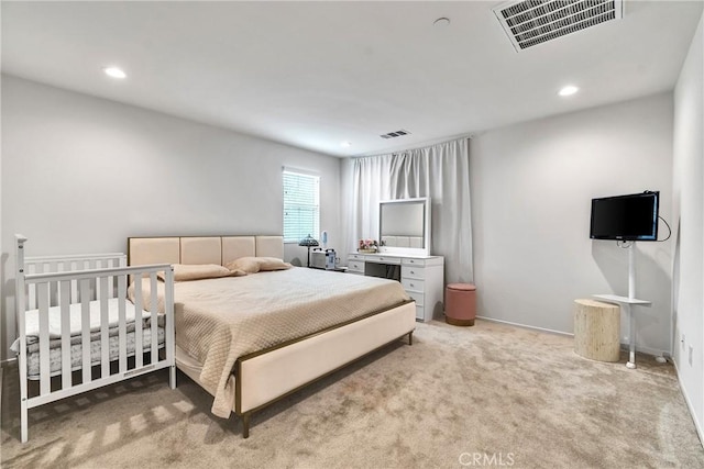 bedroom with visible vents, recessed lighting, and carpet flooring