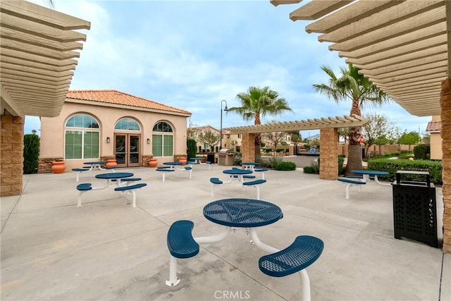 view of patio with a pergola and french doors