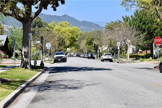 341 N Isabel St, Glendale, CA 91206 - view of street with curbs, traffic signs, and a mountain view