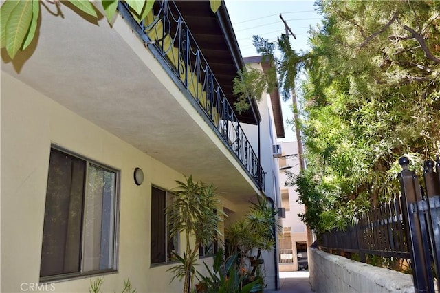 341 N Isabel St, Glendale, CA 91206 - view of side of home featuring stucco siding and fence