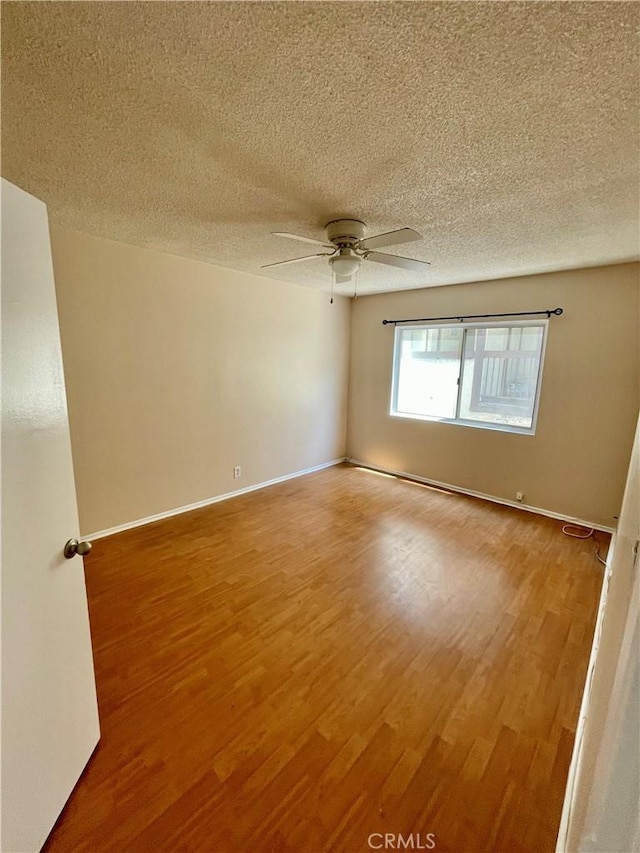 341 N Isabel St, Glendale, CA 91206 - spare room with wood finished floors, a textured ceiling, and ceiling fan