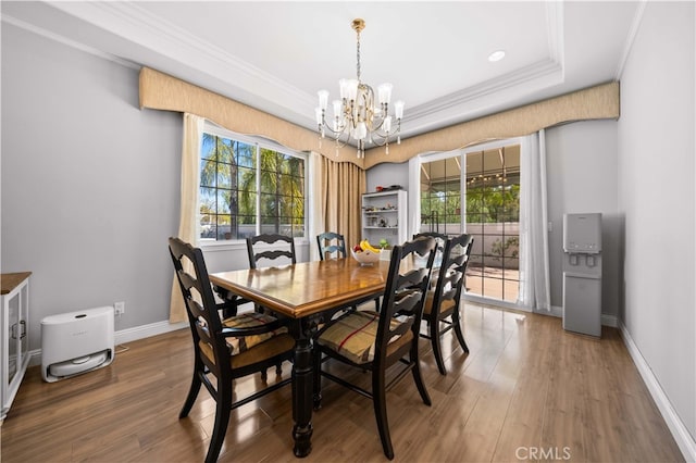 24288 Highcrest Dr, Diamond Bar, CA 91765 - dining area with baseboards, wood finished floors, an inviting chandelier, and ornamental molding