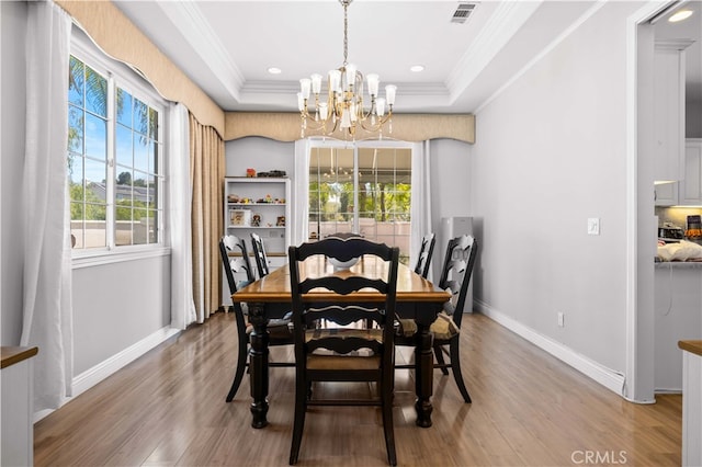 24288 Highcrest Dr, Diamond Bar, CA 91765 - dining space featuring baseboards, ornamental molding, wood finished floors, and a chandelier