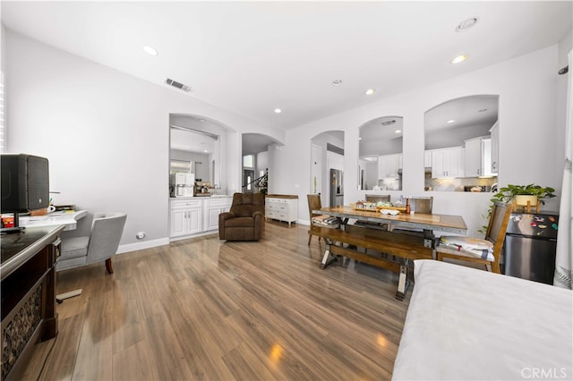 24288 Highcrest Dr, Diamond Bar, CA 91765 - dining space with baseboards, wood finished floors, visible vents, and recessed lighting
