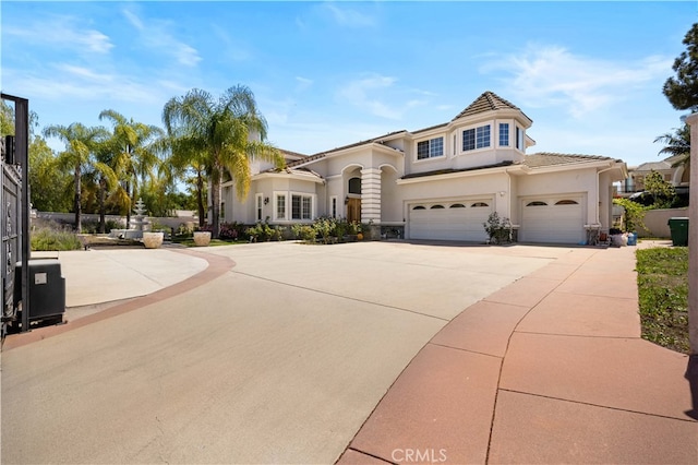 24288 Highcrest Dr, Diamond Bar, CA 91765 - mediterranean / spanish house featuring stucco siding, an attached garage, driveway, and a tile roof