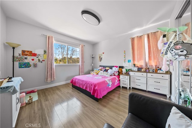 24288 Highcrest Dr, Diamond Bar, CA 91765 - bedroom with baseboards and wood finished floors