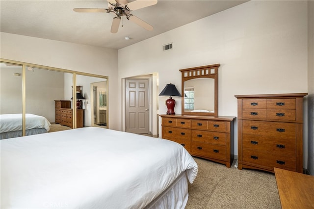 46375 Ryway Pl Unit 2, Palm Desert, CA 92260 - bedroom with light carpet, a closet, and ceiling fan