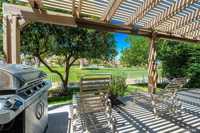 46375 Ryway Pl Unit 2, Palm Desert, CA 92260 - view of patio / terrace featuring a pergola, fence, and a grill