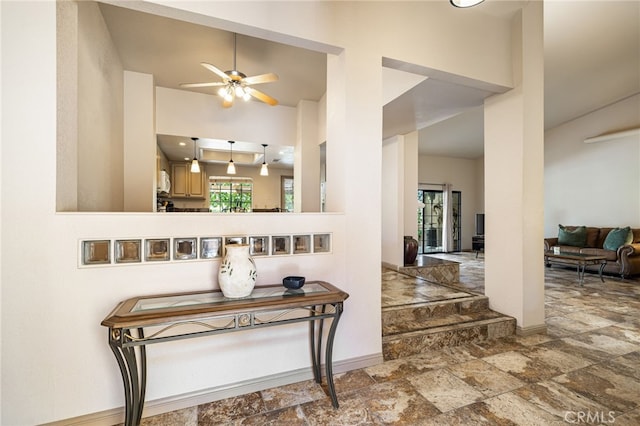 46375 Ryway Pl Unit 2, Palm Desert, CA 92260 - foyer entrance with stone tile floors and ceiling fan