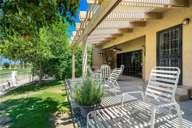 46375 Ryway Pl Unit 2, Palm Desert, CA 92260 - view of patio / terrace featuring a ceiling fan, fence, and a pergola