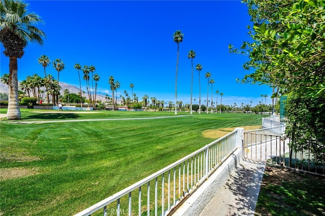 46375 Ryway Pl Unit 2, Palm Desert, CA 92260 - view of community with golf course view, a lawn, and a water and mountain view