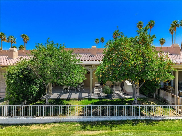 46375 Ryway Pl Unit 2, Palm Desert, CA 92260 - view of front facade with a tiled roof, a patio, and stucco siding