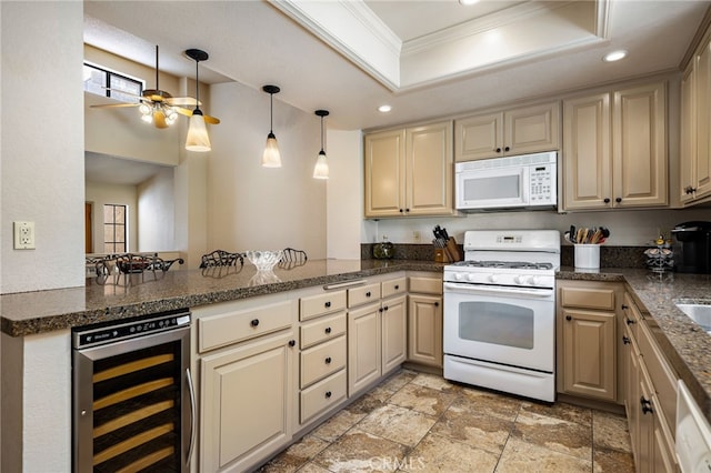 46375 Ryway Pl Unit 2, Palm Desert, CA 92260 - kitchen with white appliances, beverage cooler, a tray ceiling, a ceiling fan, and recessed lighting