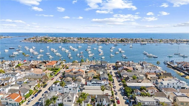 aerial view with a residential view and a water view