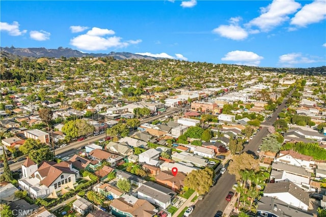 drone / aerial view with a mountain view and a residential view