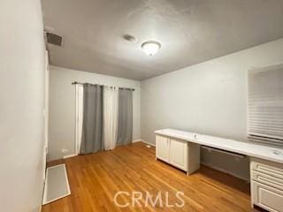 17838-17840 Los Alimos St, Granada Hills, CA 91344 - unfurnished office with built in desk and light wood-type flooring