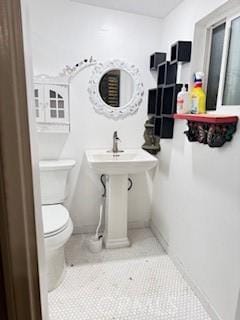 17838-17840 Los Alimos St, Granada Hills, CA 91344 - bathroom with toilet and tile patterned flooring