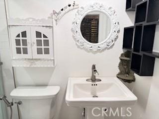 17838-17840 Los Alimos St, Granada Hills, CA 91344 - bathroom with toilet and a sink