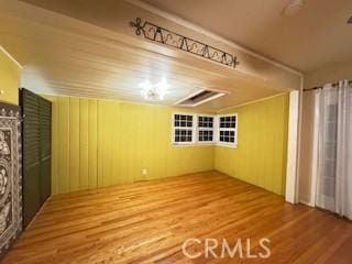 17838-17840 Los Alimos St, Granada Hills, CA 91344 - spare room featuring wood finished floors