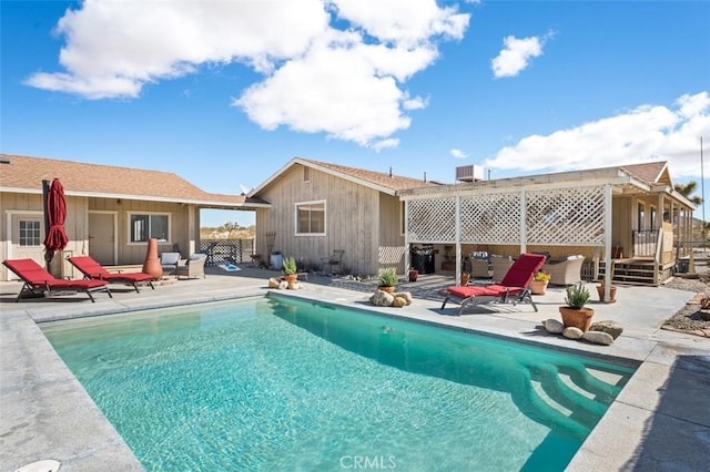 exterior space featuring a patio and a fenced in pool