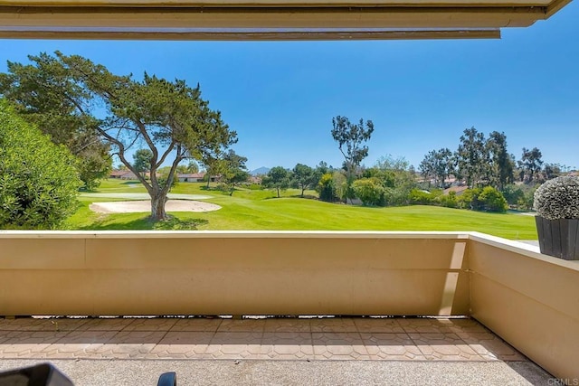 balcony featuring golf course view