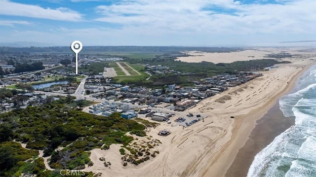 aerial view with a view of the beach and a water view