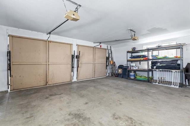 garage featuring a garage door opener