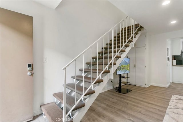 5593 Pioneer Blvd Unit 18, Whittier, CA 90601 - stairs featuring wood finished floors, recessed lighting, and baseboards