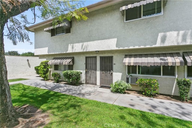 5593 Pioneer Blvd Unit 18, Whittier, CA 90601 - back of property featuring stucco siding