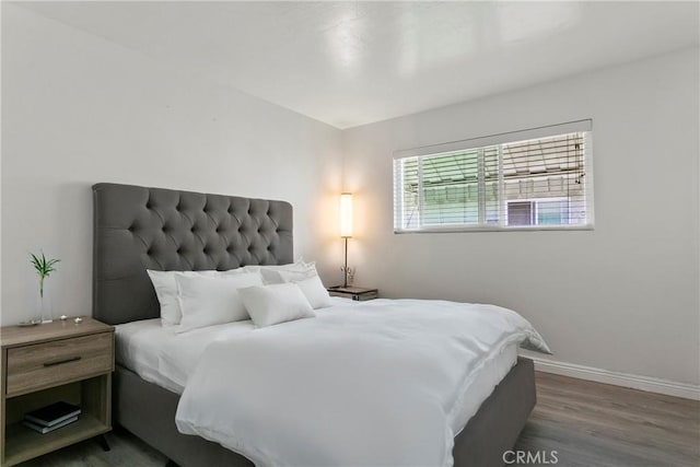 5593 Pioneer Blvd Unit 18, Whittier, CA 90601 - bedroom featuring wood finished floors and baseboards