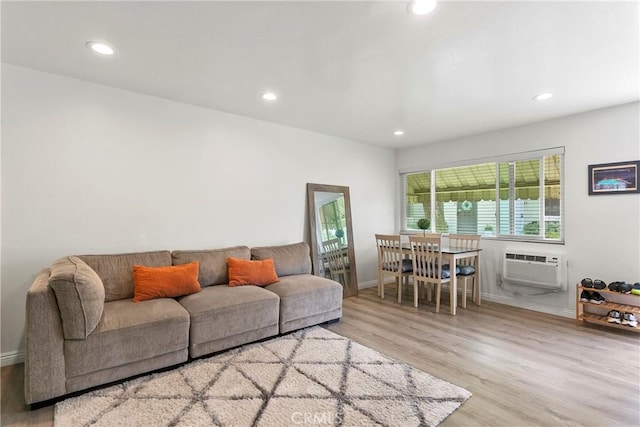 5593 Pioneer Blvd Unit 18, Whittier, CA 90601 - living room featuring wood finished floors, recessed lighting, baseboards, and a wall mounted AC